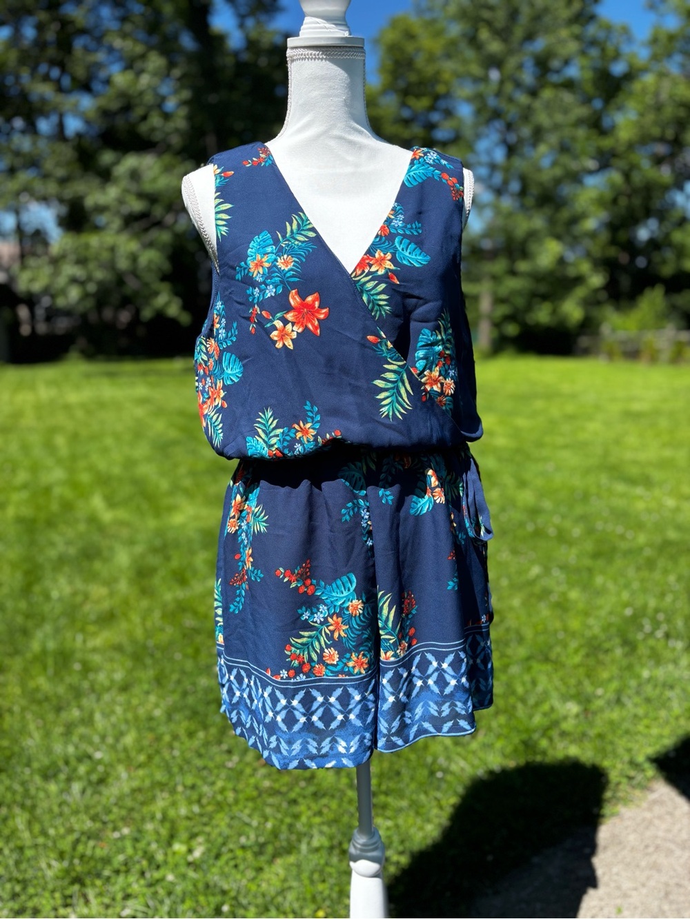 As U Wish Navy Floral Romper with Teal & Orange Accents